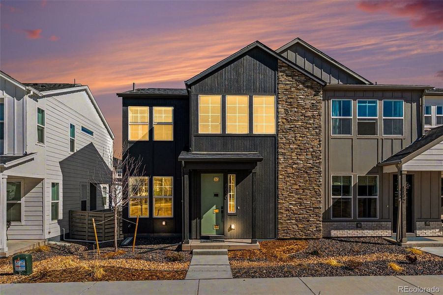Front exterior of a new home in Trumark Homes at Sterling Ranch, Littleton, CO, highlighting curb appeal (Image 1). Front exterior of a new home in Trumark Homes at Sterling Ranch, Littleton, CO, highlighting curb appeal (Image 1).