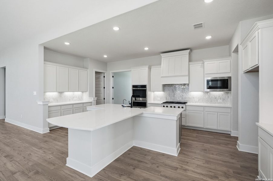 Furnished interior view inside a new home in Potranco Oaks, Castroville (Image 20).