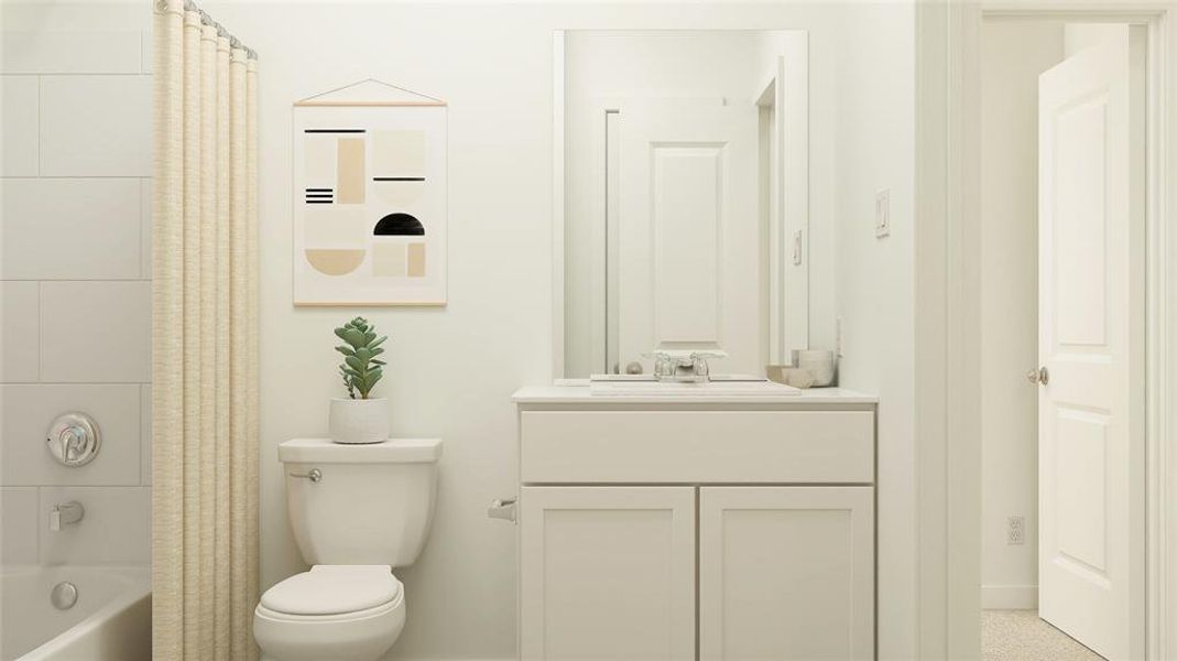 Full bathroom featuring vanity, shower / tub combo, and toilet