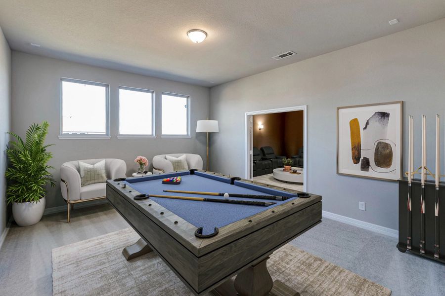 Game room. Note: Sample product photo - actual exterior and interior selections may vary by homesite