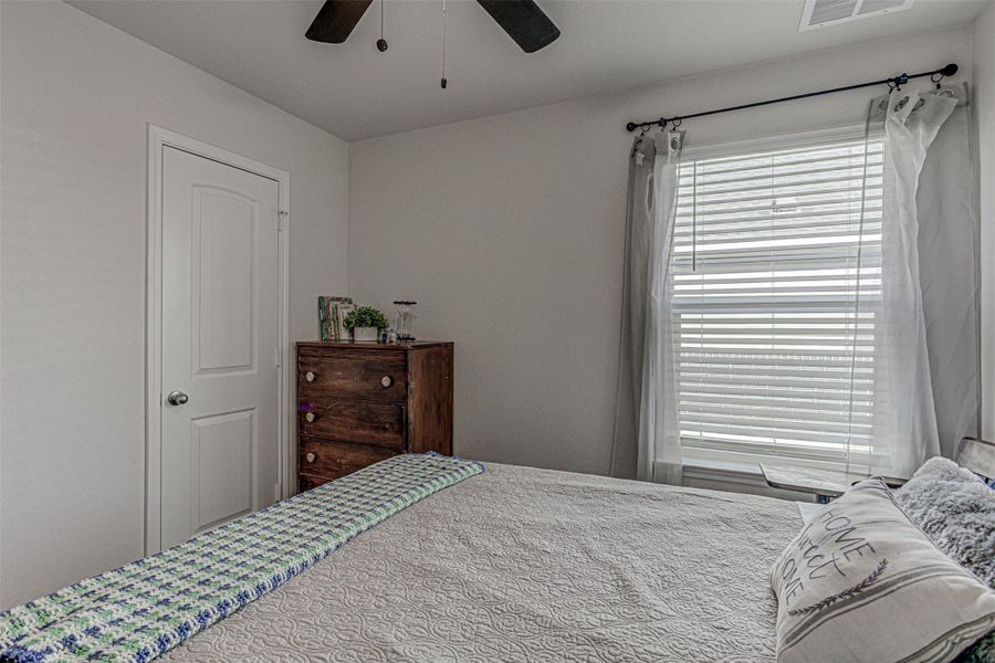 Bedroom with a ceiling fan