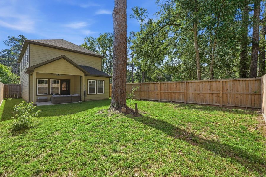 Exterior details and patio area of a home in , Conroe (Image 24). Exterior details and patio area of a home in , Conroe (Image 24).