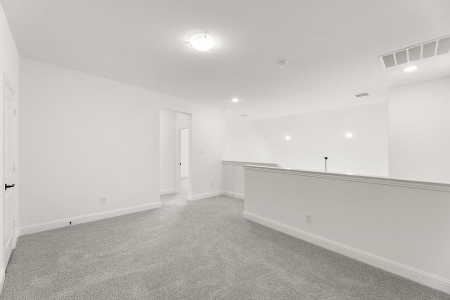Representative unfurnished interior of a home built from the Republic by Rockwell Homes in Walden Pond, Forney (Image 28).
