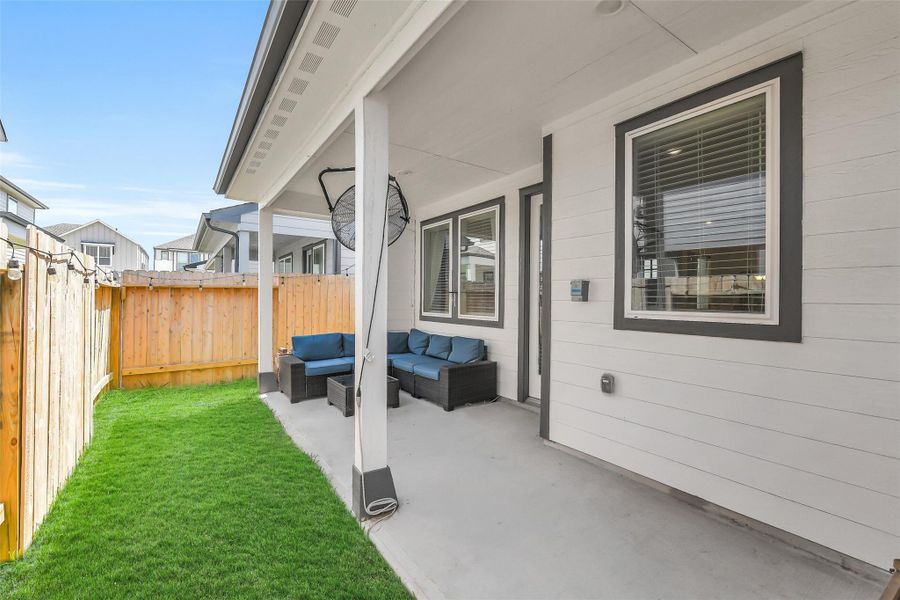 Private backyard with low-maintenance green space and plenty of room for outdoor entertaining or play.