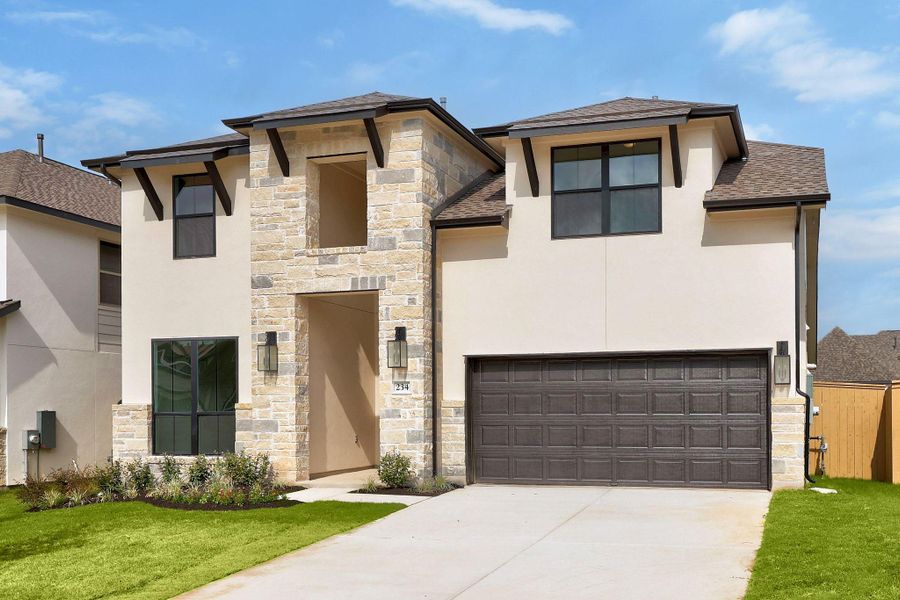 Front exterior of a new home in The Colony, Bastrop, TX, highlighting curb appeal (Image 22). Front exterior of a new home in The Colony, Bastrop, TX, highlighting curb appeal (Image 22).