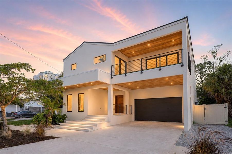 Front exterior of a new home in , Sarasota, FL, highlighting curb appeal (Image 33).