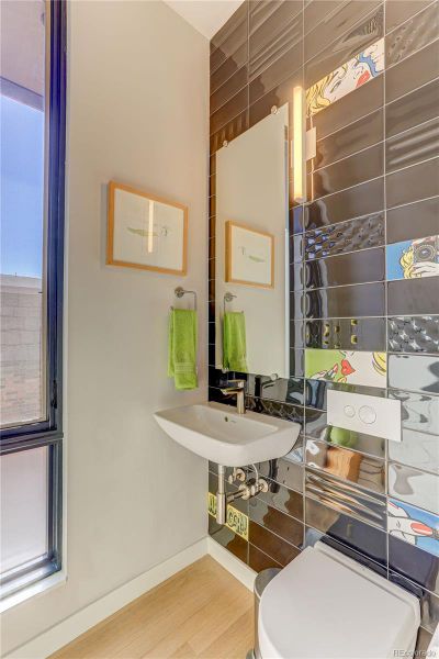 Powder Bathroom on the living level *Similar floor plan, finishes and feel at L'Avenir! Not of the actual build.