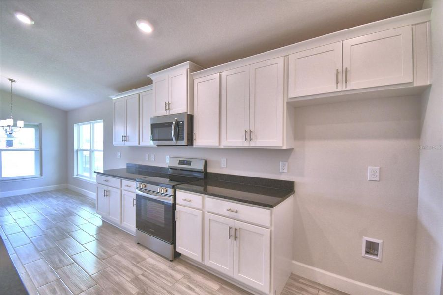 Furnished interior view inside a new home in Lake Juliana Estates, Auburndale (Image 10).