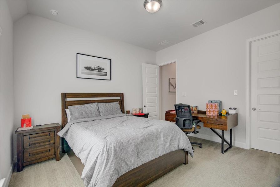 The generous 14' x 12' fourth bedroom functions as a true ensuite, offering a private full bath and a well-sized walk-in closet for added comfort and convenience.