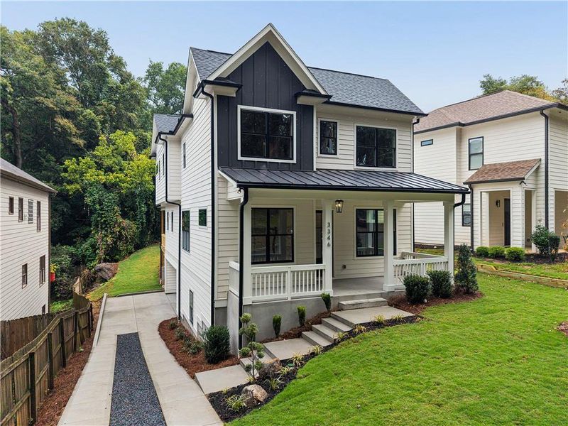 Front exterior of a new home in , Scottdale, GA, highlighting curb appeal (Image 1). Front exterior of a new home in , Scottdale, GA, highlighting curb appeal (Image 1).