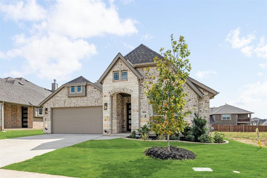 Front exterior of a new home in Eagle Glen 50, Alvarado, TX, highlighting curb appeal (Image 1). Front exterior of a new home in Eagle Glen 50, Alvarado, TX, highlighting curb appeal (Image 1).
