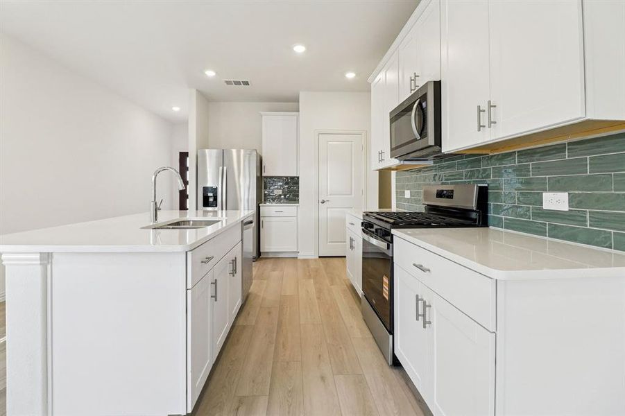 Photo is not of the actual home, but is an inspirational photo of builder’s model home and may depict options, furnishings, and/or decorator features that are not included.
