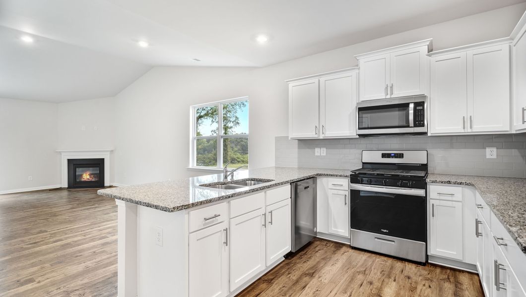 Representative furnished interior of a home built from the Davidson by D.R. Horton in Brookside Farms, Greer (Image 6).