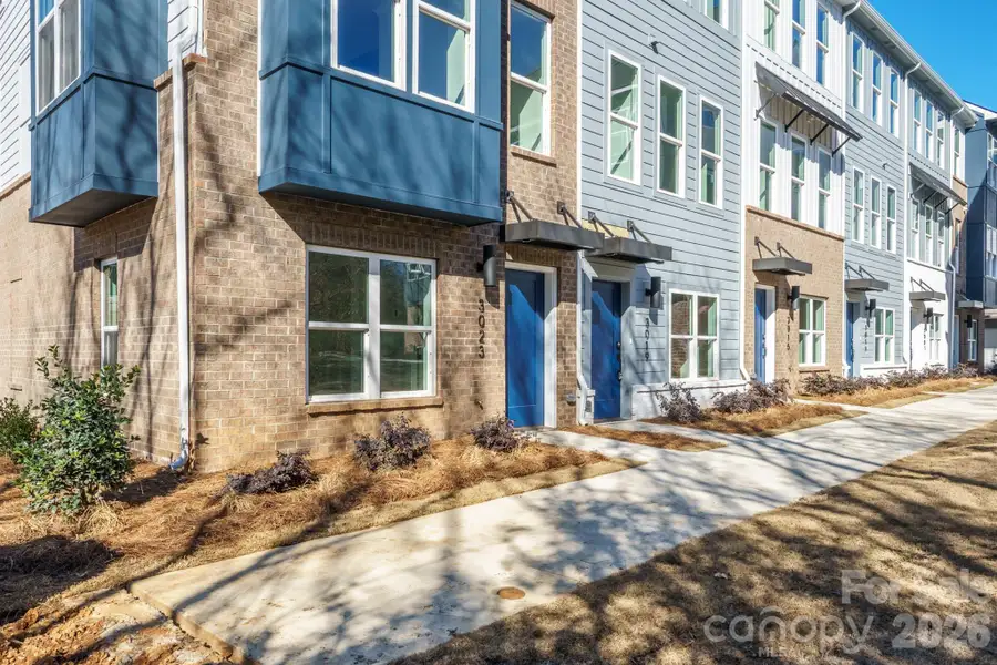 Modern four-level townhome featuring striking contemporary architecture and a prime Charlotte location close to shopping, dining, entertainment, and major commuter routes. Modern four-level townhome featuring striking contemporary architecture and a prime Charlotte location close to shopping, dining, entertainment, and major commuter routes.