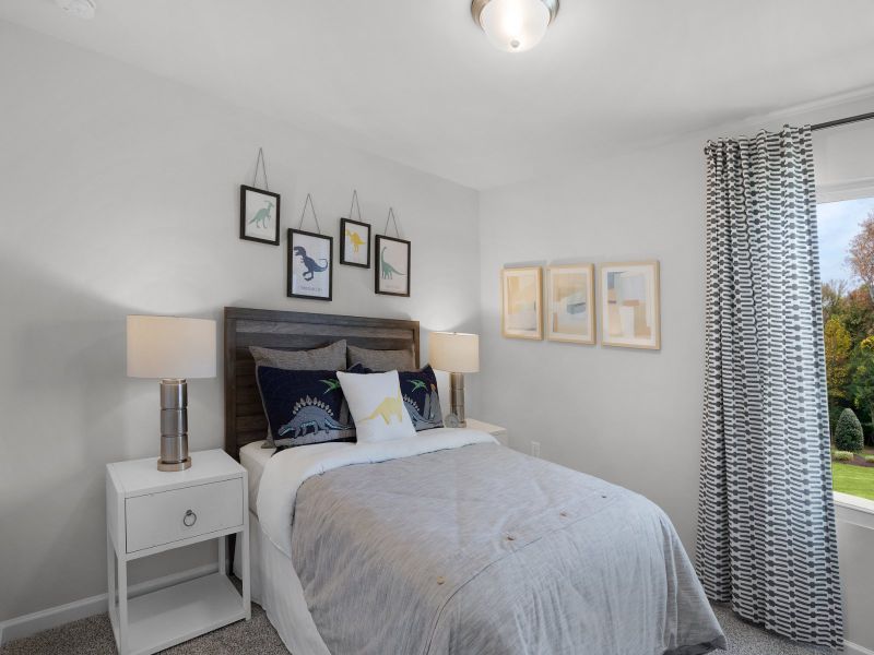 Secondary bedroom in the Brentwood floorplan at a Meritage Homes community in Graham, NC.