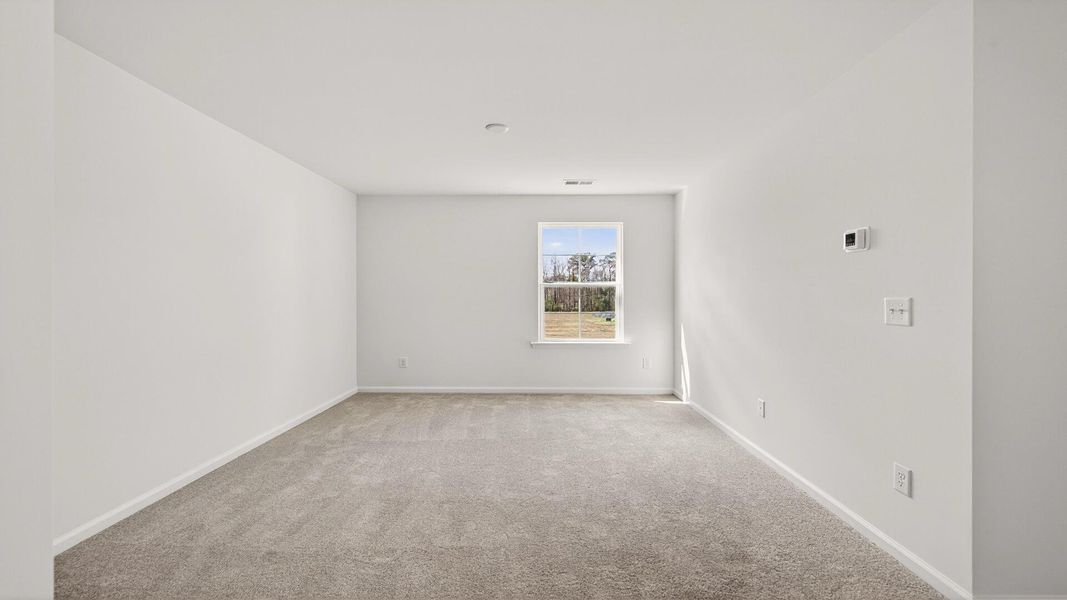 Spacious, unfurnished interior of a new home in Creekside at Andrews, Summerville (Image 16).