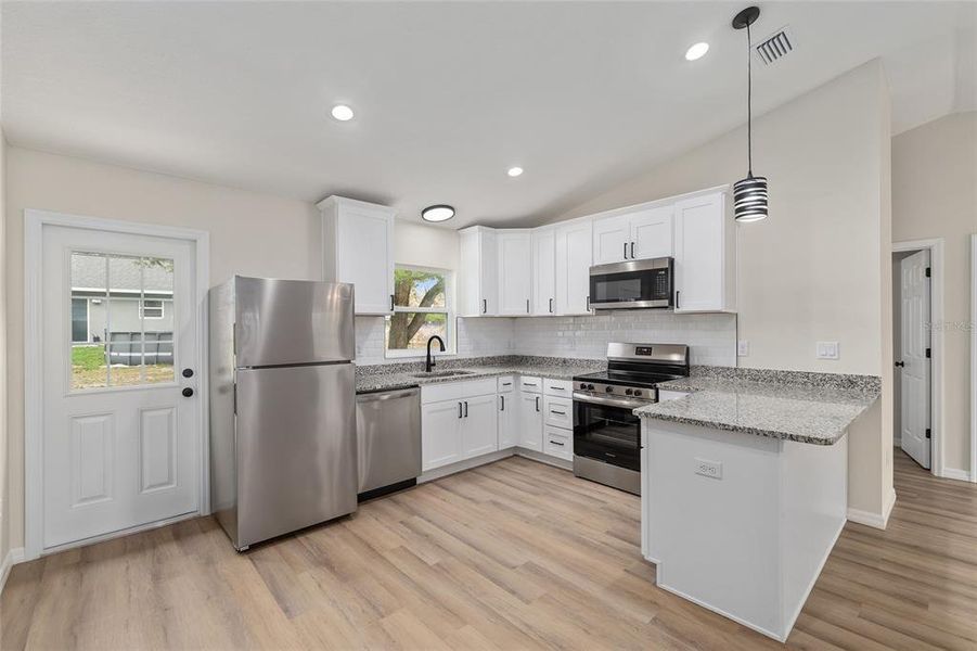 Furnished interior view inside a new home in , Dunnellon (Image 6).