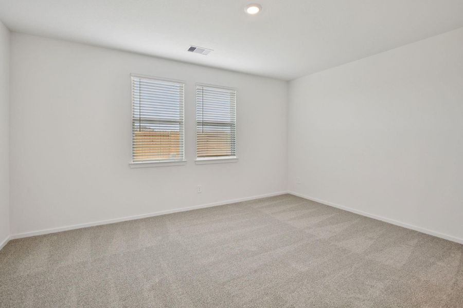 Spacious, unfurnished interior of a new home in Sanford Farms - Traditional Series, Waller (Image 24).