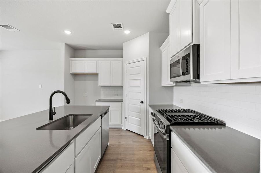 Furnished interior view inside a new home in Kings Way, Denton (Image 7).