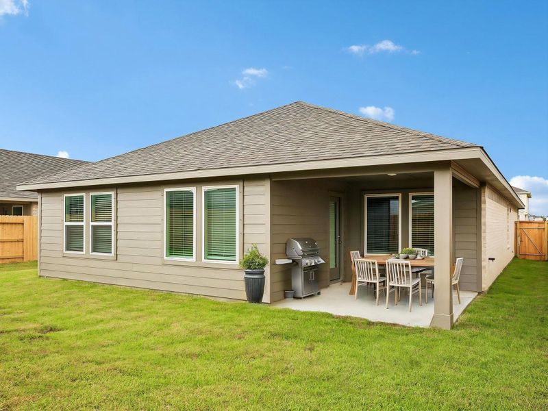 Exterior details and patio area of a home in Heights of Barbers Hill, Baytown (Image 3).