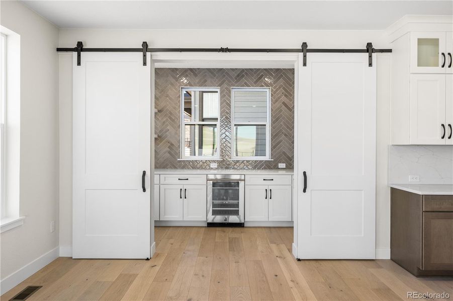 Furnished interior view inside a new home in Autograph at Lyric, Lone Tree (Image 8).