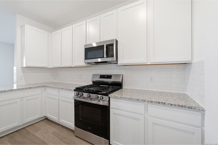 Furnished interior view inside a new home in Garden Grove, San Antonio (Image 6).