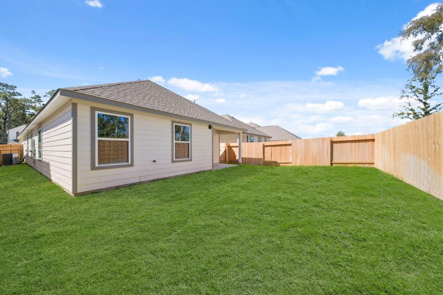 Exterior details and patio area of a home in Cypresswood Landing, Humble (Image 17).