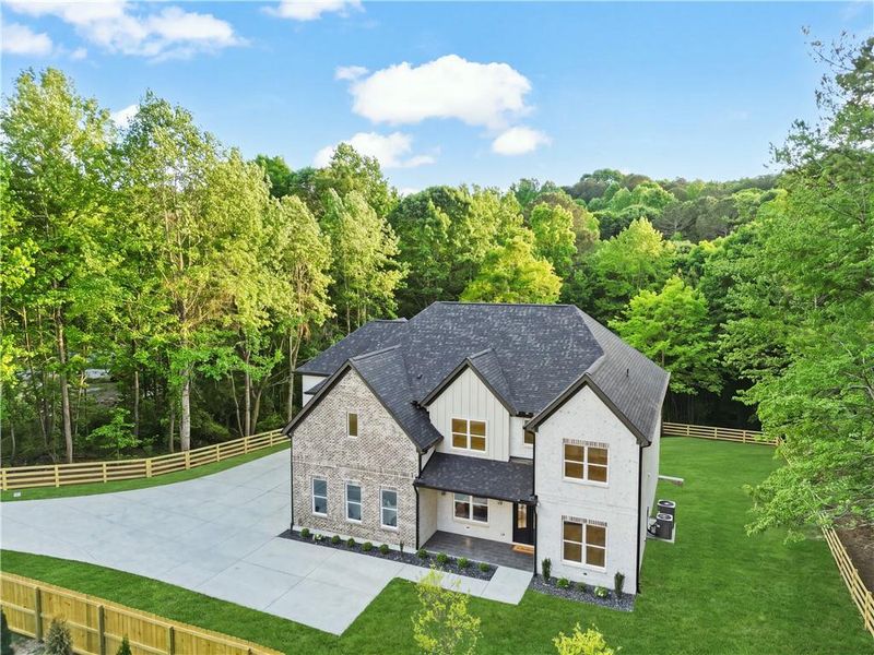 Front exterior of a new home in , Lawrenceville, GA, highlighting curb appeal (Image 32).