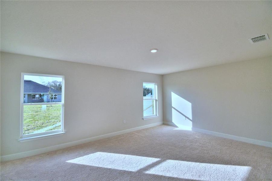 Spacious, unfurnished interior of a new home in Cadence Crossing, Auburndale (Image 26).