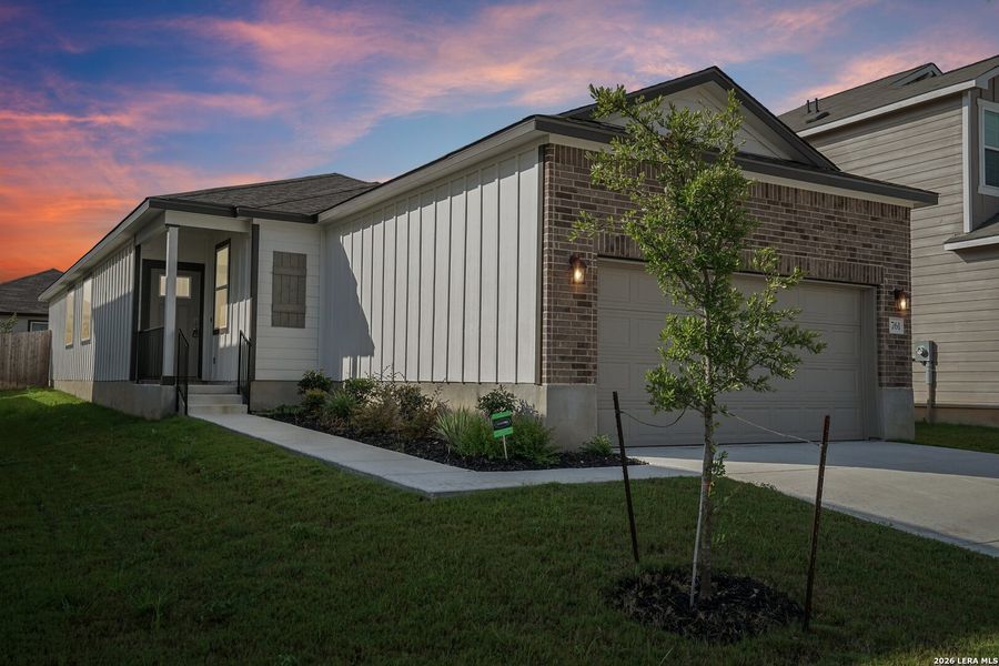 Front exterior of a new home in , New Braunfels, TX, highlighting curb appeal (Image 2). Front exterior of a new home in , New Braunfels, TX, highlighting curb appeal (Image 2).