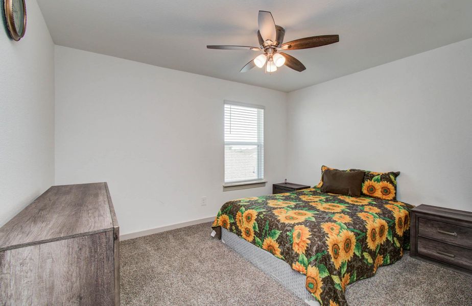Furnished interior view inside a new home in Parks Edge, Missouri City (Image 3).