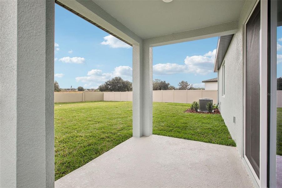 Exterior details and patio area of a home in Two Rivers - Classic Series, Zephyrhills (Image 22).