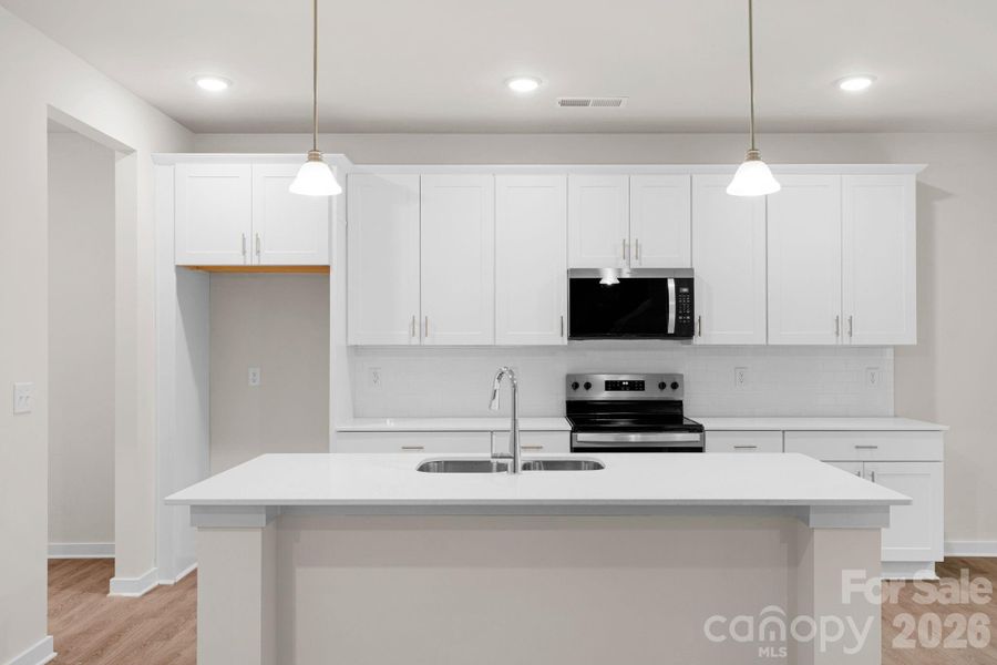 Furnished interior view inside a new home in , Monroe (Image 9).