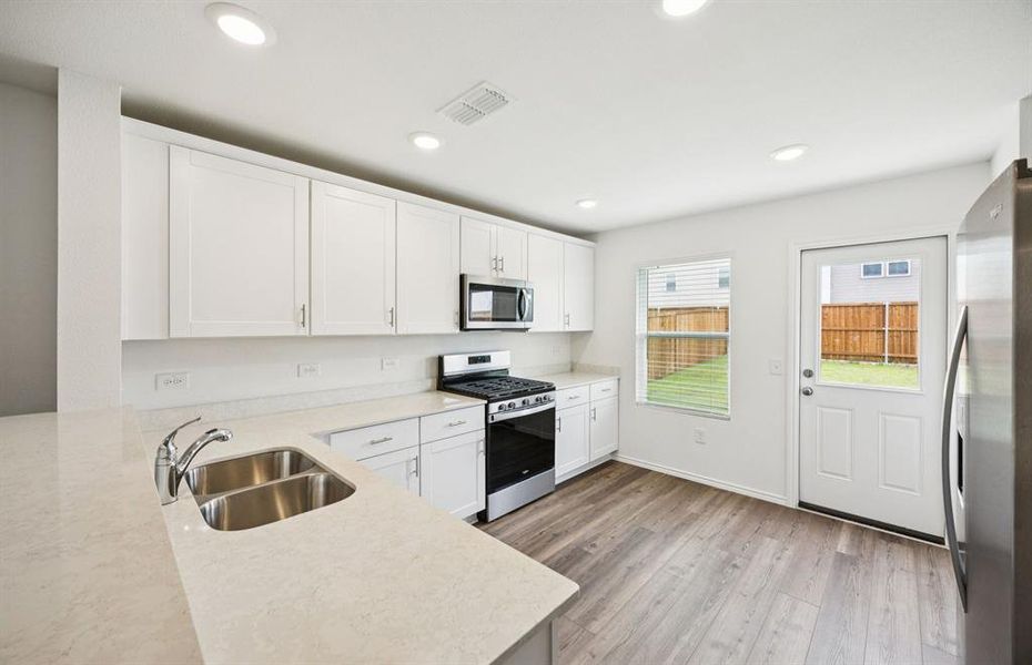 Abundant cabinet space in kitchen