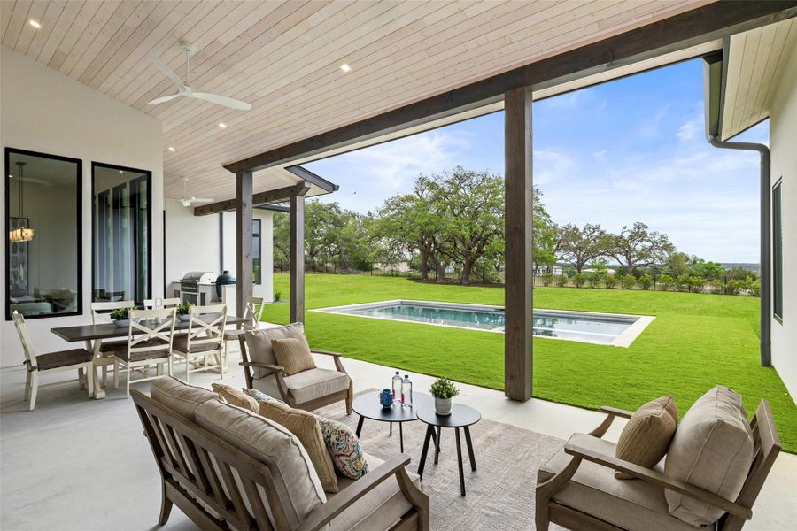 View of patio / terrace featuring outdoor lounge area, an outdoor pool, and ceiling fan View of patio / terrace featuring outdoor lounge area, an outdoor pool, and ceiling fan