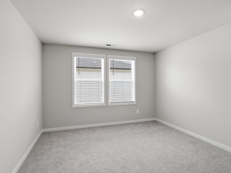 Spacious, unfurnished interior of a new home in The Heritage at Buffaloe Reserve, Raleigh (Image 16). Spacious, unfurnished interior of a new home in The Heritage at Buffaloe Reserve, Raleigh (Image 16).