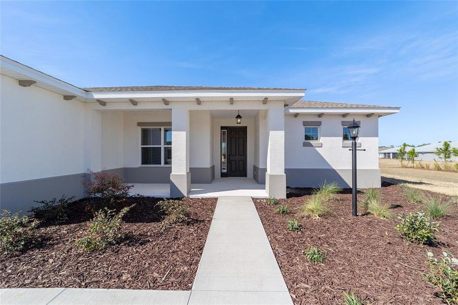 Exterior details and patio area of a home in On Top of the World Communities, Ocala (Image 23).