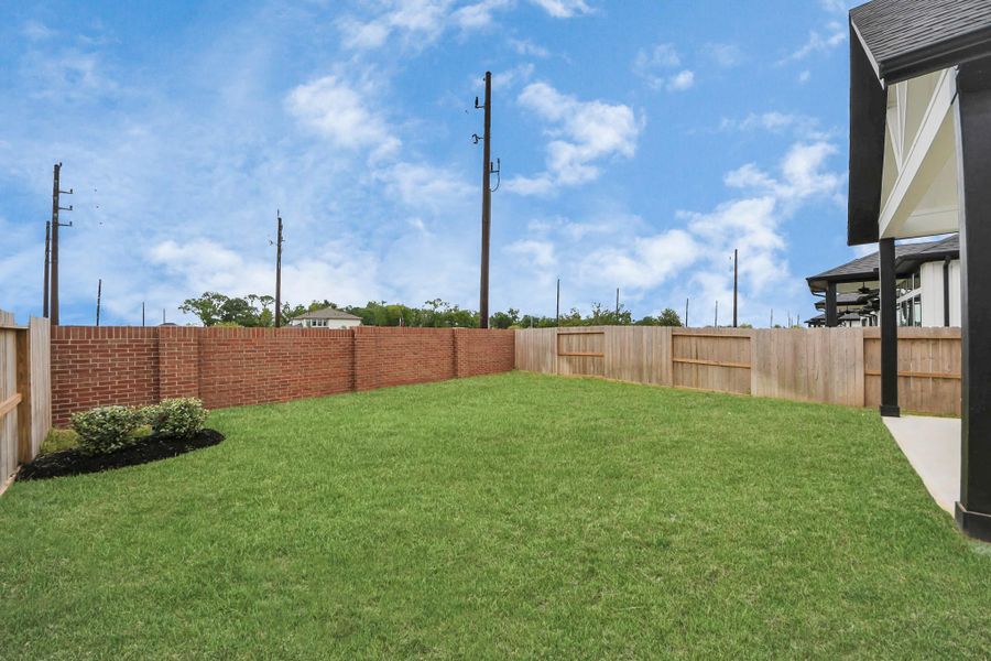 Exterior details and patio area of a home in , Missouri City (Image 26).
