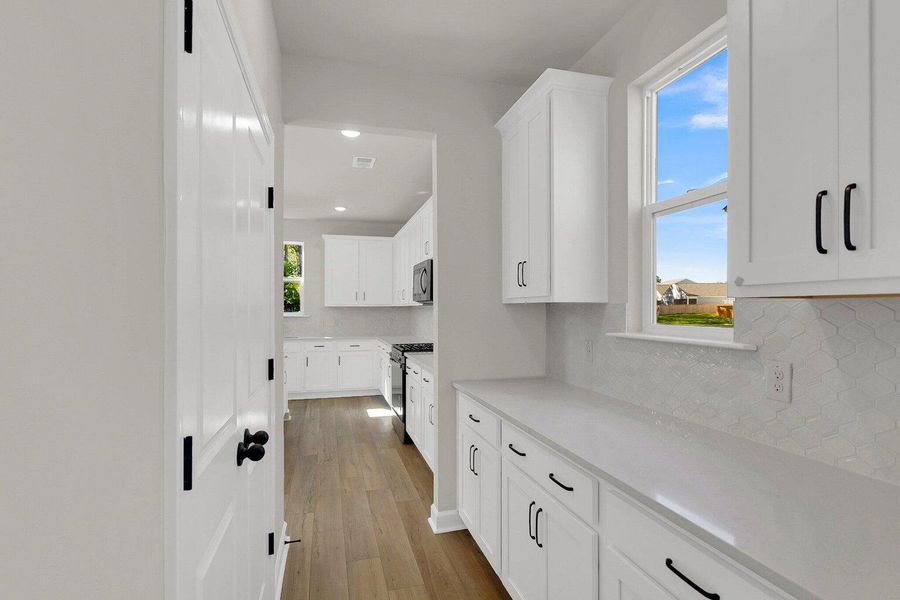Furnished interior view inside a new home in Tea Farm: Presidents Series, Ravenel (Image 12).