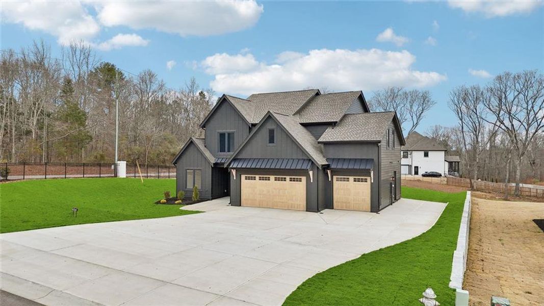 Front exterior of a new home in , Auburn, GA, highlighting curb appeal (Image 53).