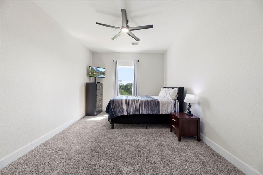 Furnished interior view inside a new home in , Cypress (Image 35).