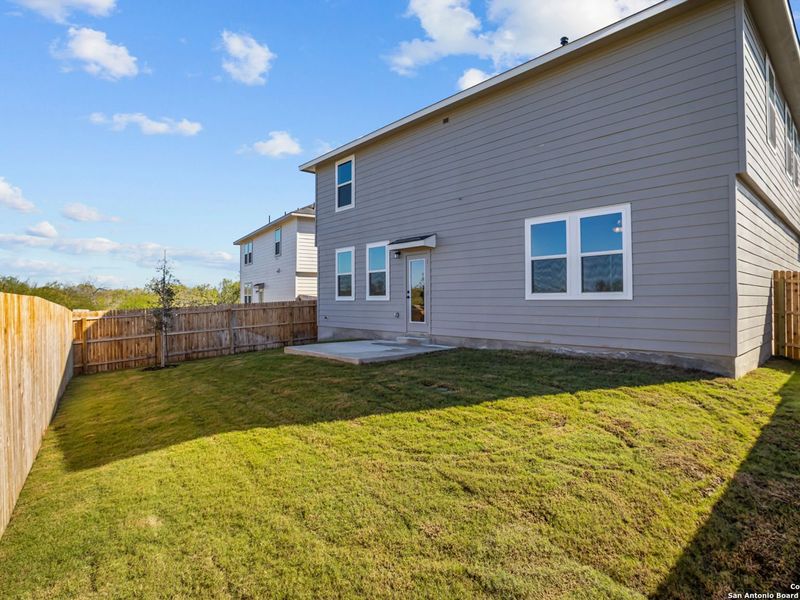 Exterior details and patio area of a home in Horizon Pointe, Converse (Image 29).