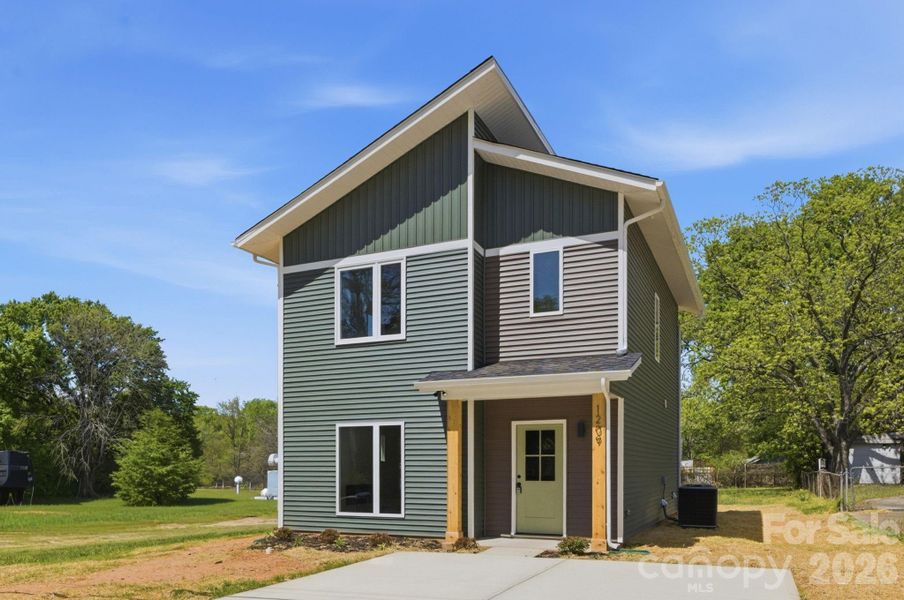 Front exterior of a new home in , Kannapolis, NC, highlighting curb appeal (Image 1). Front exterior of a new home in , Kannapolis, NC, highlighting curb appeal (Image 1).