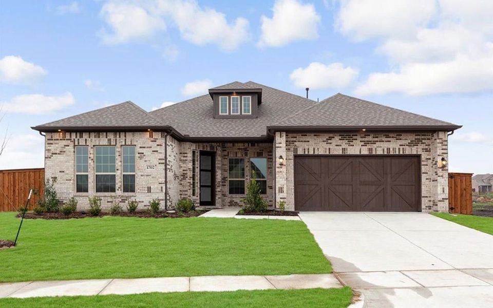 Representative exterior photo of a completed home built from the Santa Barbara by CastleRock Communities in Solterra, Mesquite, TX (Image 19).