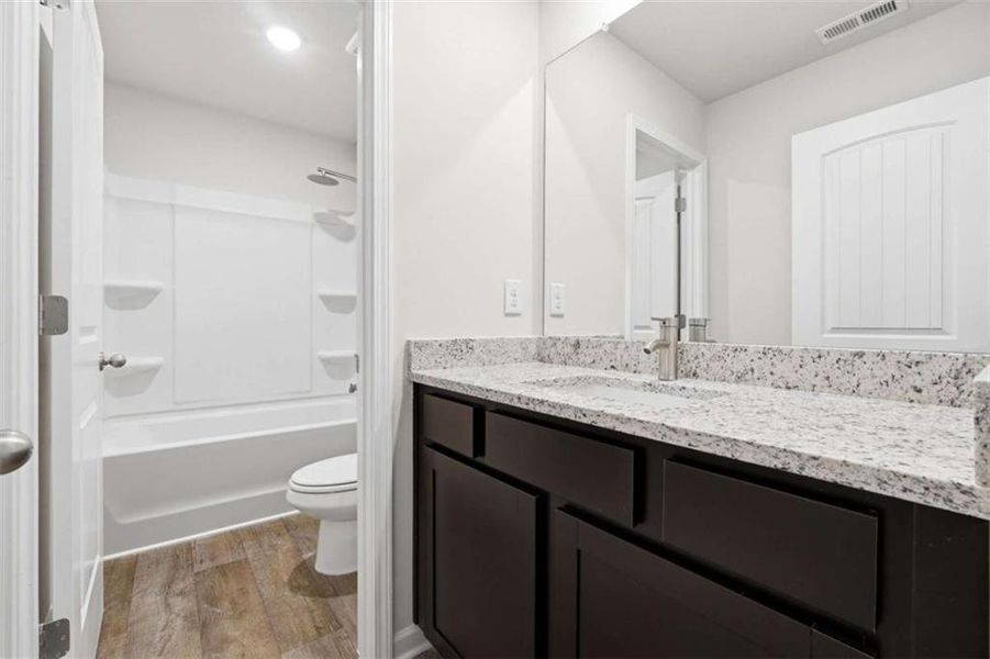 Furnished interior view inside a new home in , Perry (Image 3). Furnished interior view inside a new home in , Perry (Image 3).