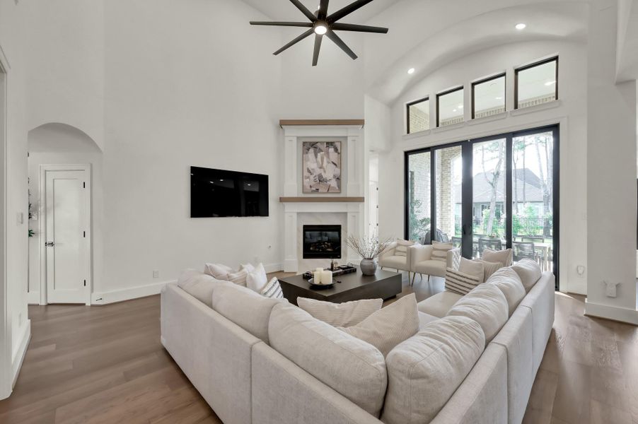 Elegant finishes and generous proportions make this living room the true heart of the home whether you are enjoying the impressive fireplace, entertaining, or relaxing on a quite day.
