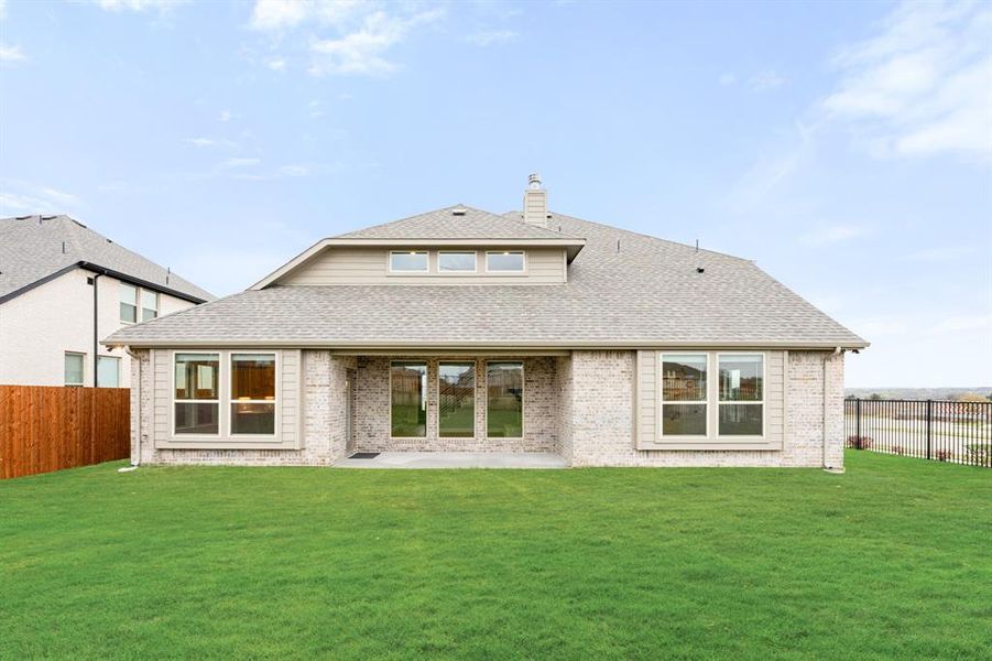 Exterior details and patio area of a home in Villages of Walnut Grove, Midlothian (Image 25).