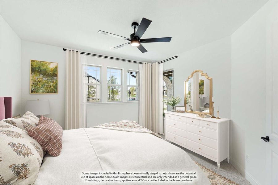 Bedroom with ceiling fan, white dresser with mirror, and double windows with curtains