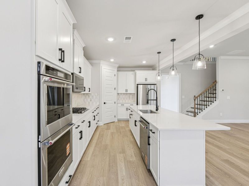 Furnished interior view inside a new home in Vines at Mill Creek - Legacy Series, Braselton (Image 8). Furnished interior view inside a new home in Vines at Mill Creek - Legacy Series, Braselton (Image 8).