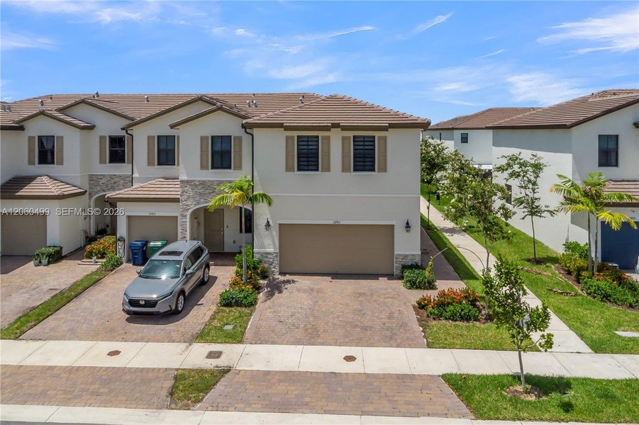 Front exterior of a new home in , Miami, FL, highlighting curb appeal (Image 23).